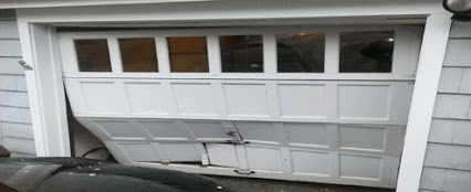Out of tracks overhead door Scarsdale